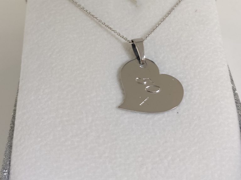 Pendant in the form of a heart with a meaningful engraving