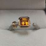 Ring mit Citrin Edelstein im Asscherschliff gebettet in gelb-gold und sandgestrahlter Weißgoldschiene